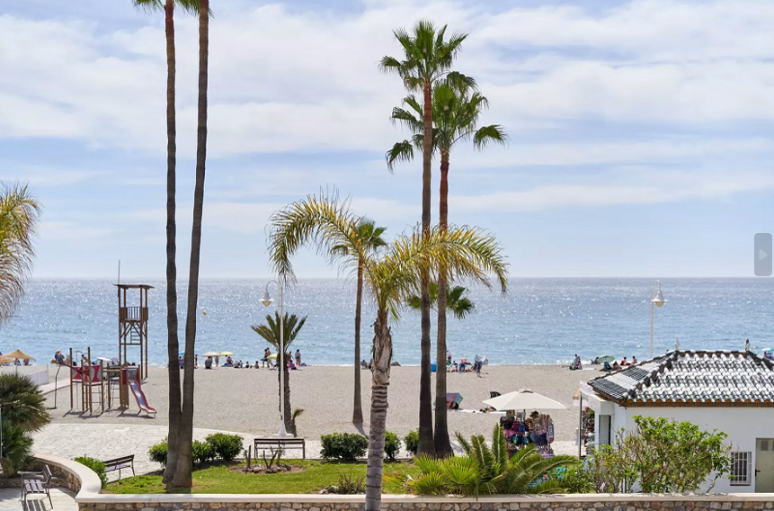 Luxury sea view apartment with large terrace directly on the famous Burriana beach of Nerja.