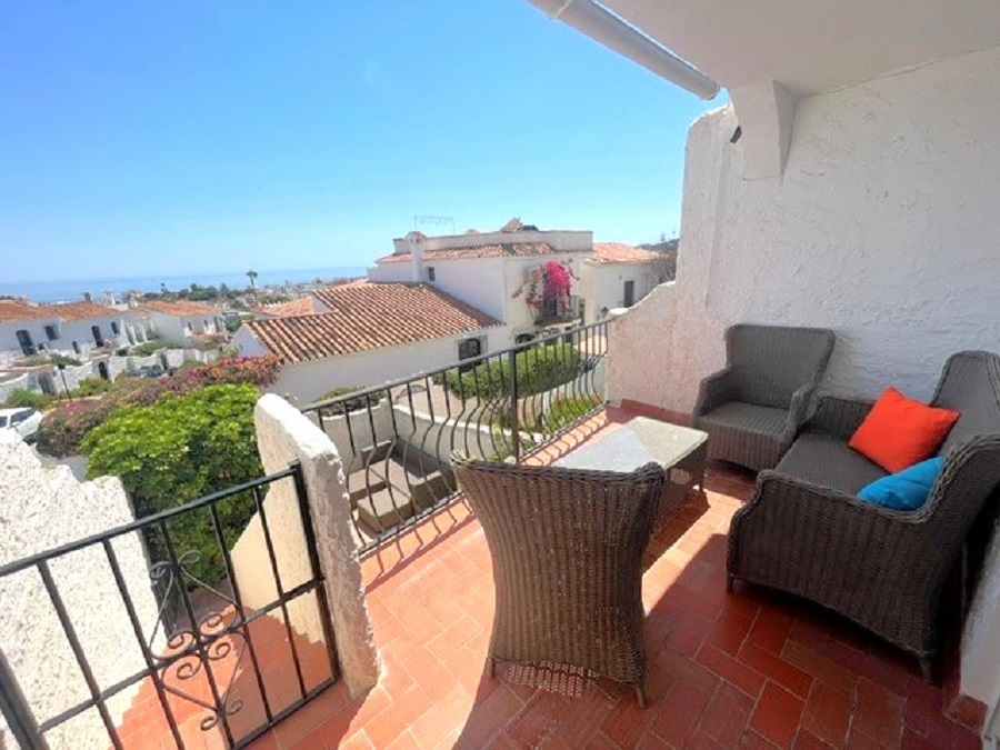 Gerenoveerde vakantiewoning in het gewilde Capistrano Village in Nerja met prachtig uitzicht over Capistrano village en de zee.